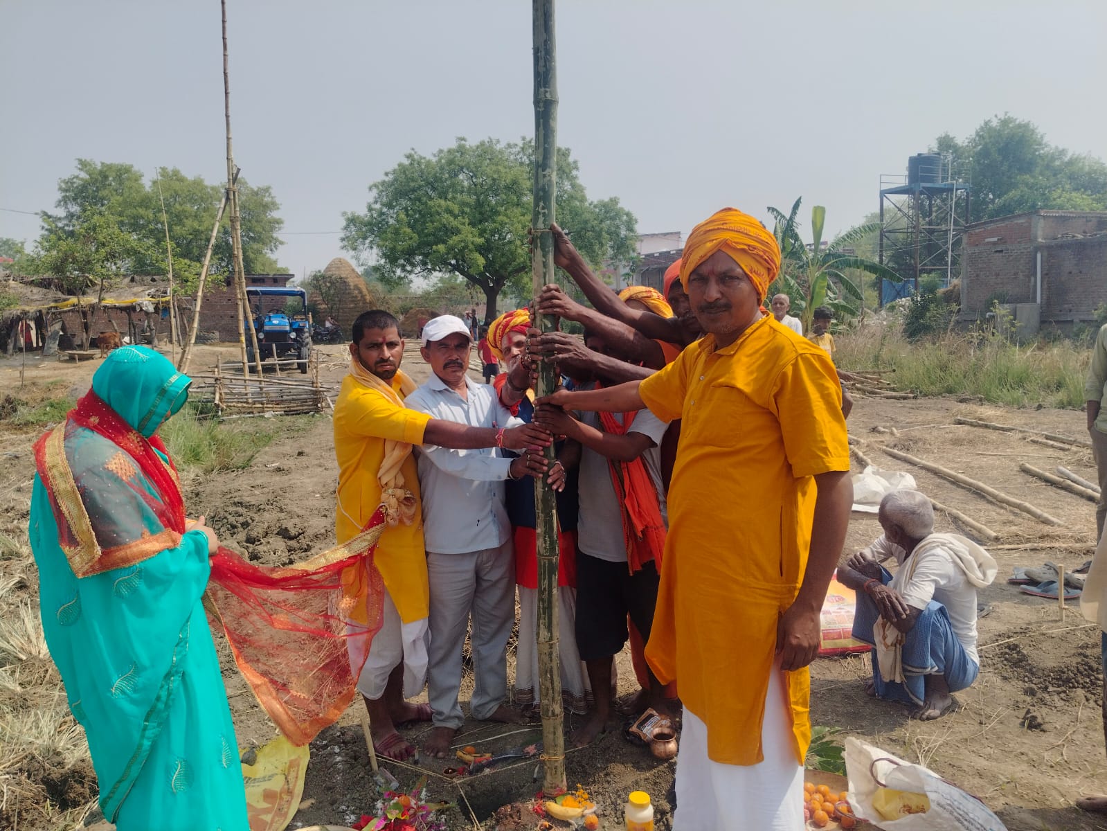 Ceremonial flag raising during puja